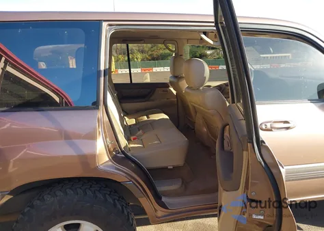 1999 Toyota Land Cruiser from USA, damaged, VIN JT3HT05J4X0056193